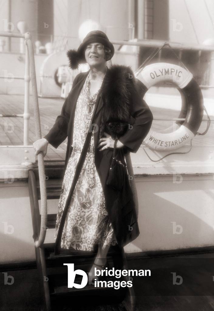 Ethel Barrymore (1879-1959), American actress, posing for press photographers on the deck of the ocean liner, Olympic. c. 1920