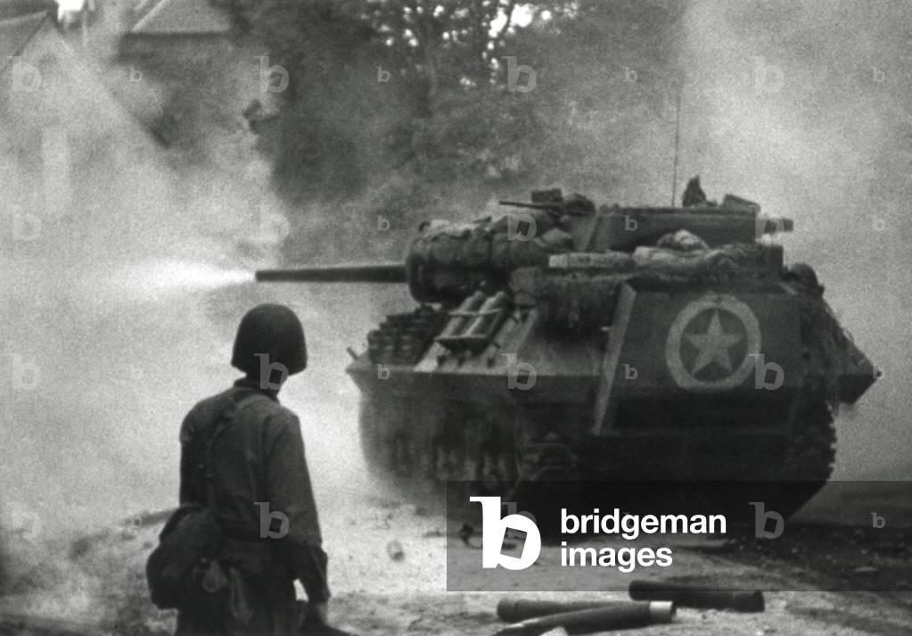 U.S. tank firing in Saint Lo, France, July 1944. The Norman town strategically located at the intersection of main roads on the Lower Normandy Peninsula. France, World War 2