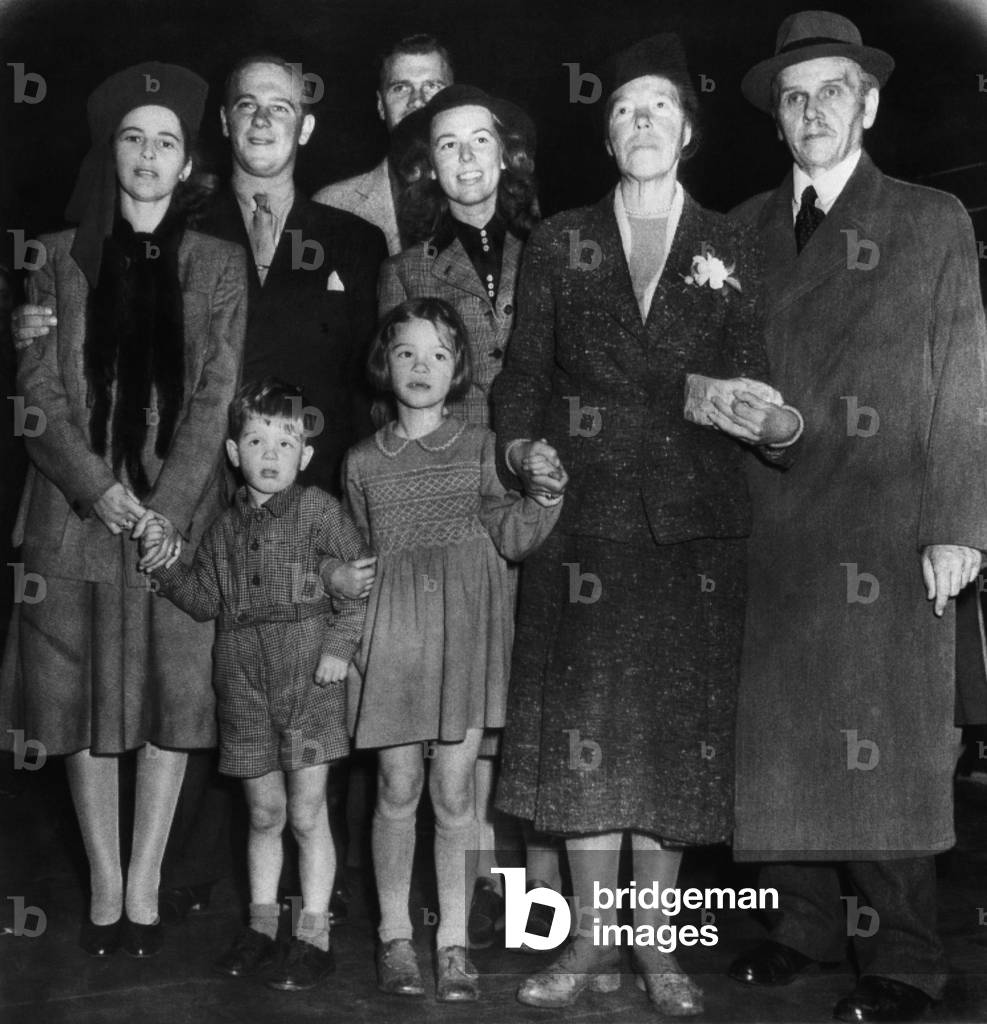 Russian Royalty. Front row, from left: Mrs. Guri Kulikovsky, Leonid Kulkovsky, Ksenie Kulkovsky, Russian Grand Duchess Olga Alexandrovna Kulikovsky, Russian Colonel Nikolai Kulikovsky. Second row, from left: Guri Kulikovsky, Mrs. Jihon Kulikovsky. Back row: Jihon Kulikovsky. Quebec, Canada, 1948