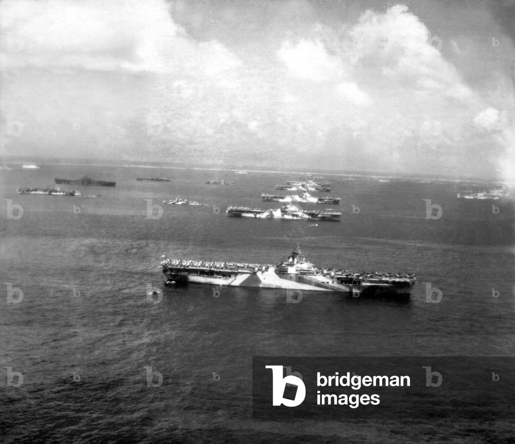 'Murderers Row', U.S. Air Craft Carriers at Ulithi Atoll, Dec. 1944. Foreground to background: USS Wasp, USS Yorktown USS Hornet, USS Hancock, USS Ticonderoga, USS Lexington. World War 2, Pacific Ocean