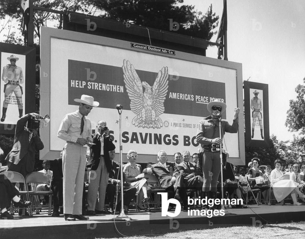 Actor Clayton Moore in his Lone Ranger character promotes U.S. Savings Bonds. Washington, D.C. June 17, 1958.
