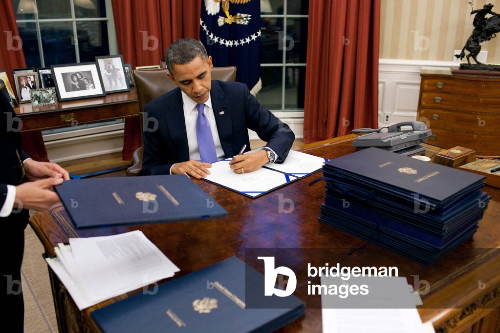 President Barack Obama signs many bills passed by the 111th Congress in its lame duck session. Dec. 22 2010.,