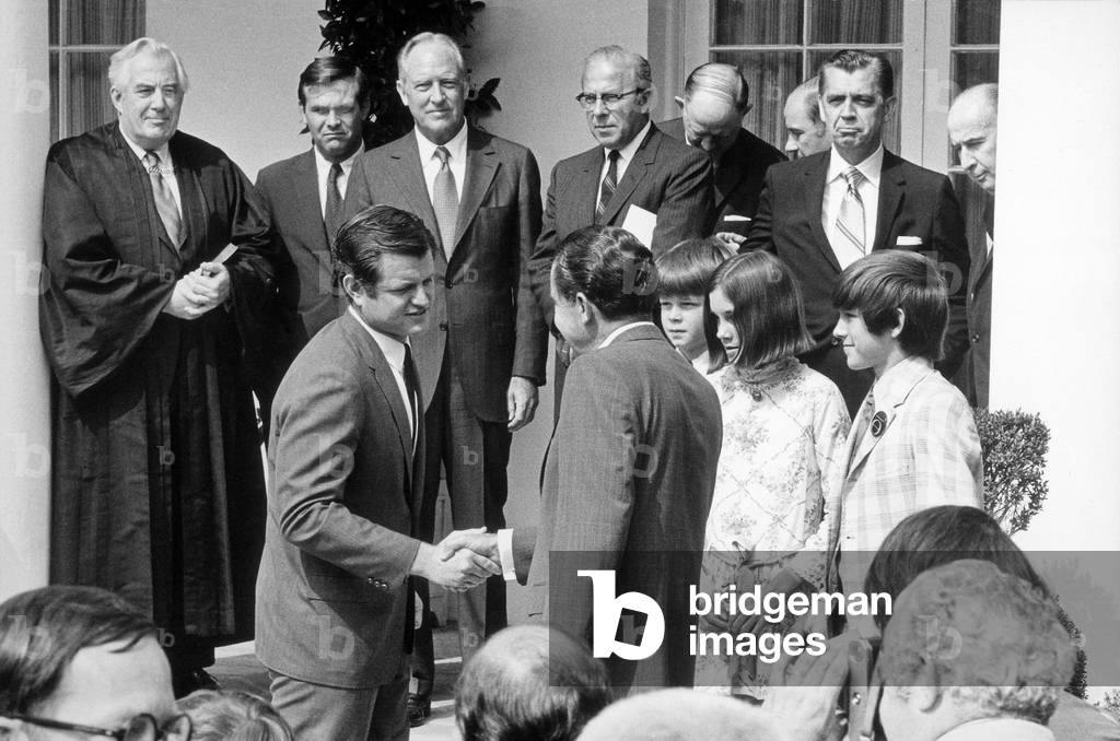 President Nixon shaking hands with Senator Ted Kennedy at the White House swearing-in ceremony for Secretary Elliott l. Richardson and Counselor Robert H. Finch. June 23 1970
