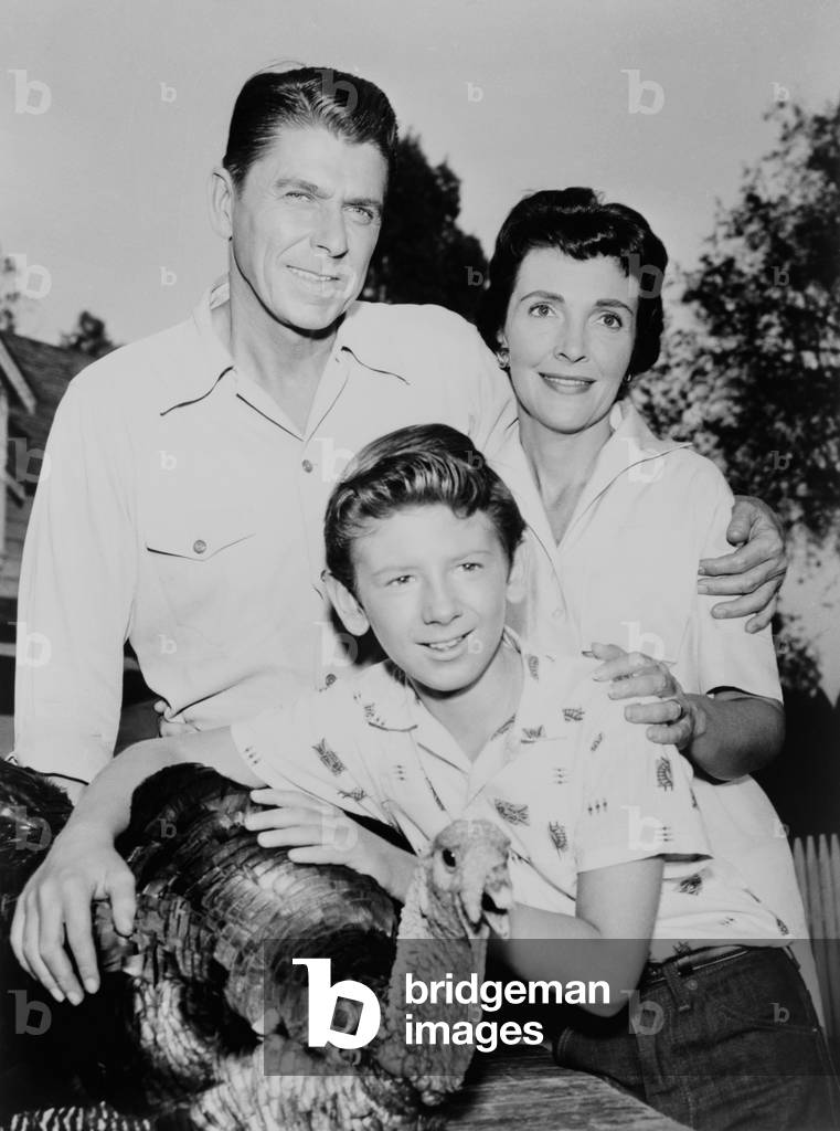 Nancy Davis, Ronald Reagan, Tommy Nolan and a live turkey pose for G.E. Theater publicity photo. 1958.