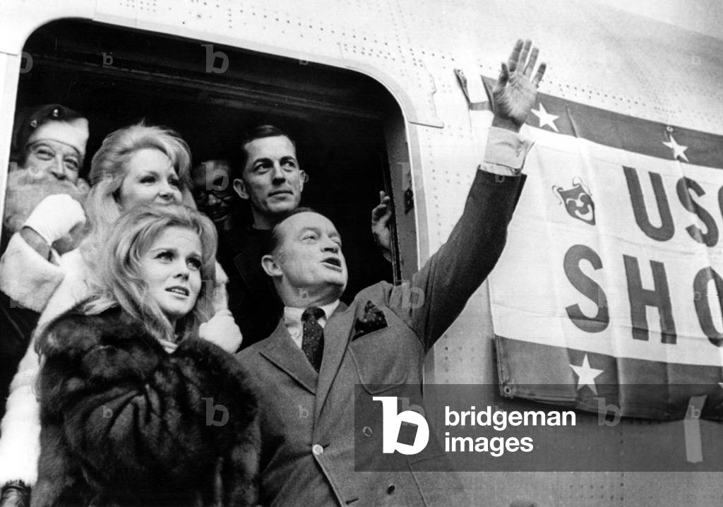 ANN-MARGRET, BOB HOPE and Co. wave goodbye at the conclusion of Hope's 1968 Vietnam Christmas show tour