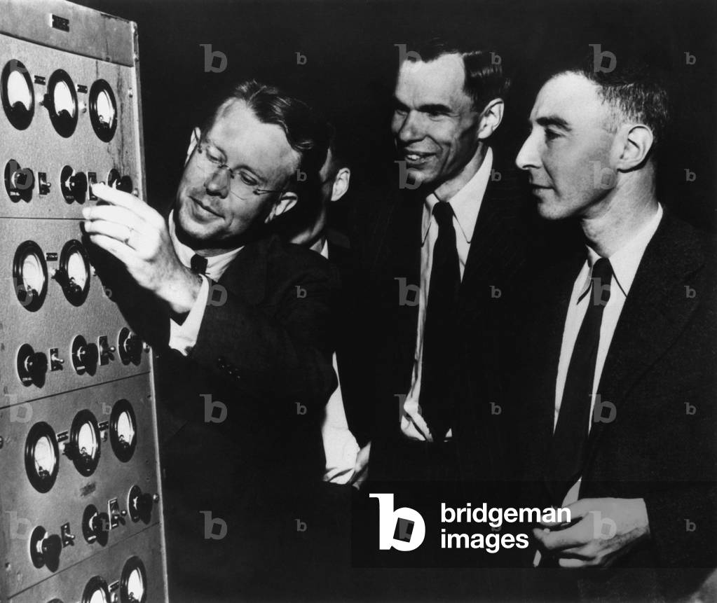 Ernest Lawrence, Glenn Seaborg, and Robert Oppenheimer at the Radiation Laboratory. All three scientists were working at the University of California, Berkeley. Early 1946.