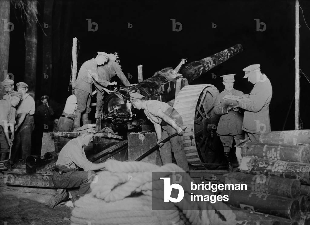 British soldiers getting artillery in position at night during World War 1. Artillery was often moved to new positions under the cover of darkness. c. 1914-18
