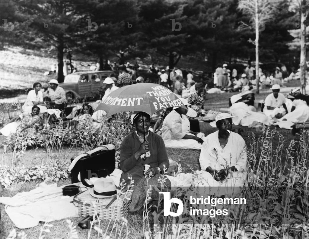 Some of the 2000 Father Divine followers at the 'Promised Land Olympic Games'. The scheduled games failed to come off, but everyone had a swell time eating. Kingston, N.Y. July 8, 1937. -