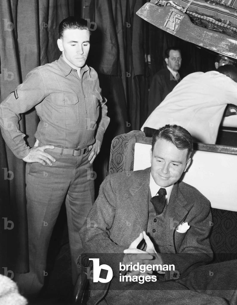 Conscientious objector, actor Lew Ayers, enroute to a labor camp at Cascade Locks Oregon. March 30, 1942. During World War II there were 152 Civilian Public Service camps in the U.S. where men performed 'work of national importance under civilian direction' as an alternative to military service