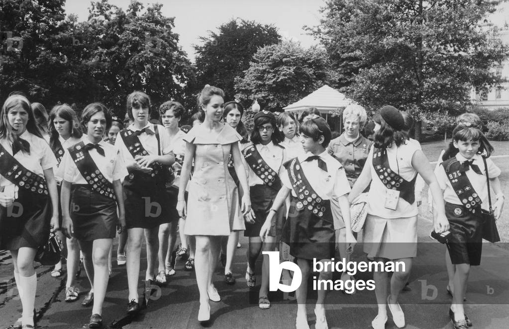 First Daughter, Julie Nixon Eisenhower with a group of Girl Scouts at the White House. c. 1970s