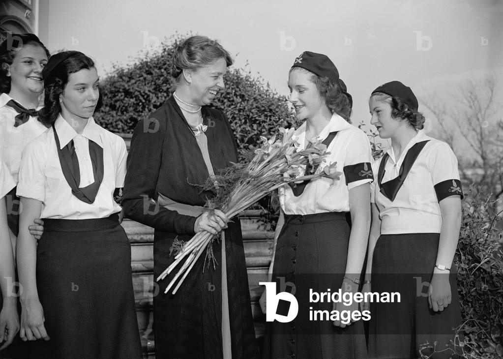 Eleanor Roosevelt greets Camp Fire Girls at the White House. April 15, 1948