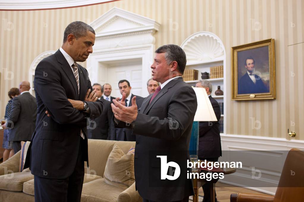 President Barack Obama talks with King Abdullah II of Jordan in Oval Office. Jan. 17, 2012