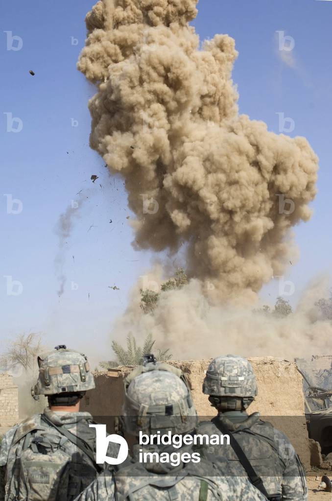 US soldiers destroy an insurgent hideout with explosives in the village of Shuzayf Iraq on March 26 2009