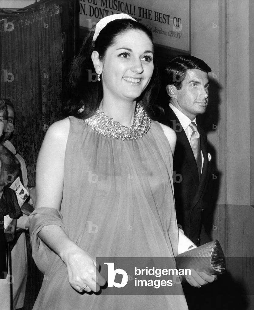 Lynda Bird Johnson, escorted by actor George Hamilton after seeing the Broadway 'Mame.' The President's daughter is working as a magazine writer in New York City. March 14, 1967