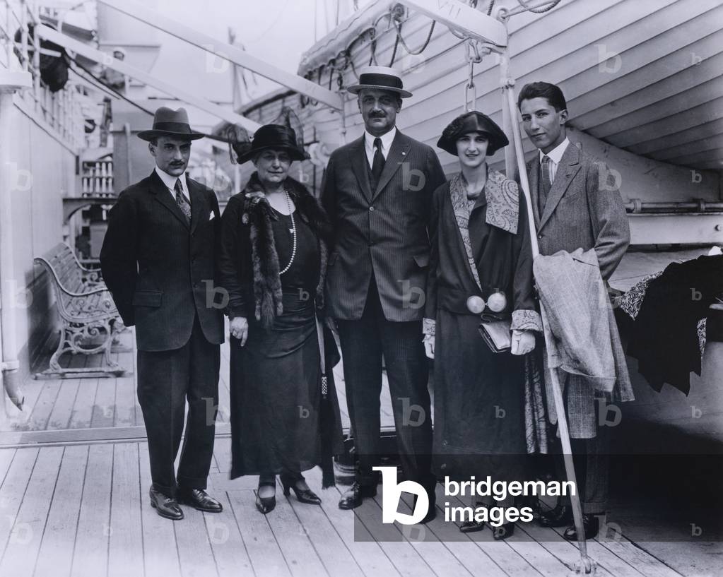 Amadeo Peter Giannini 1870-1949 with his family aboard S.S. Guilio Cesare on July 13 1923. Giannini was the Italian American founder of Bank of America which he first opened under as the Bank of Italy in 1904 to serve immigrant laborers discriminated