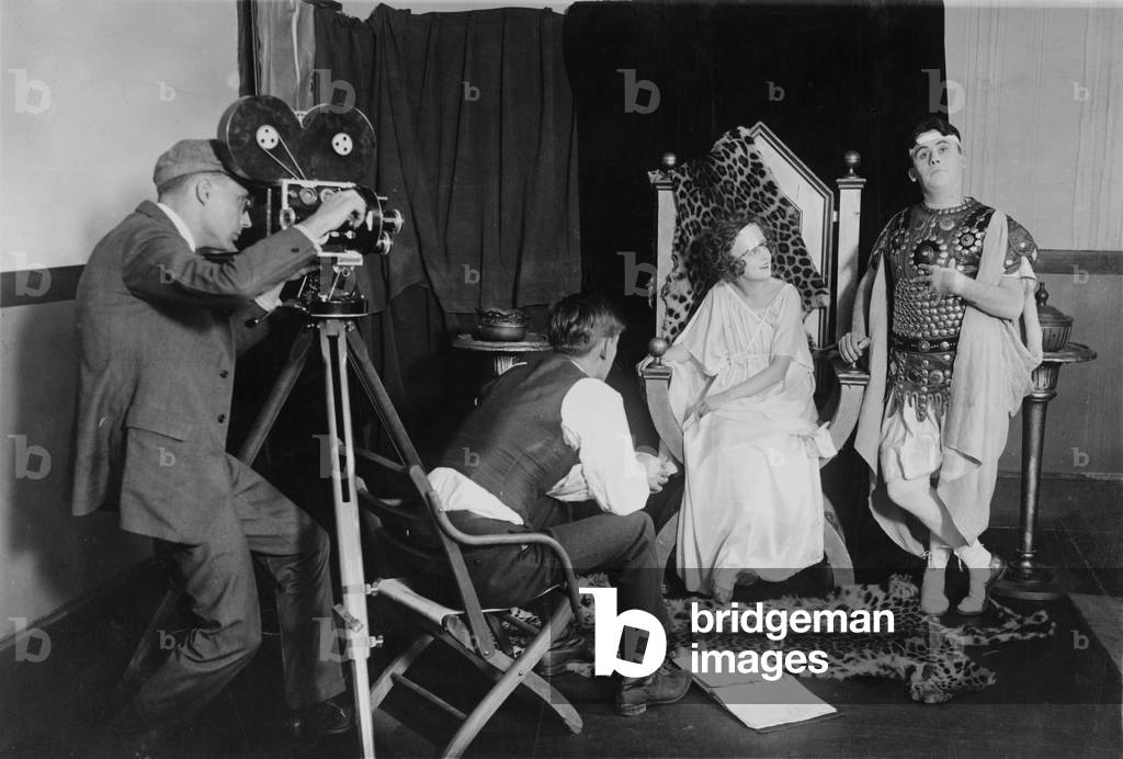 Margaret Gorman (second from right), who was crowned Miss America of 1921, being filmed for a burlesque on the burning of Rome by the Washington Producing Company, November 2, 1922