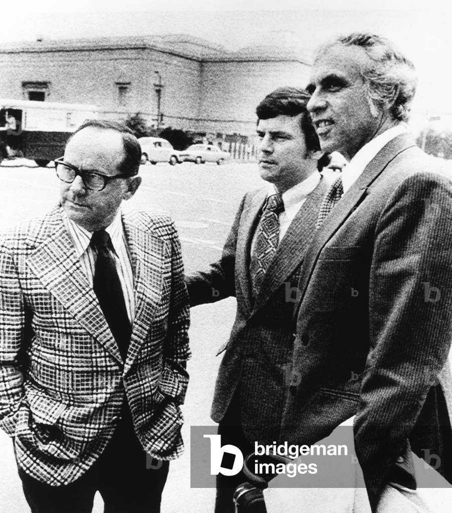 Watergate burglar Bernard Barker (center) leaves federal court in Miami on Oct. 27, 1972
