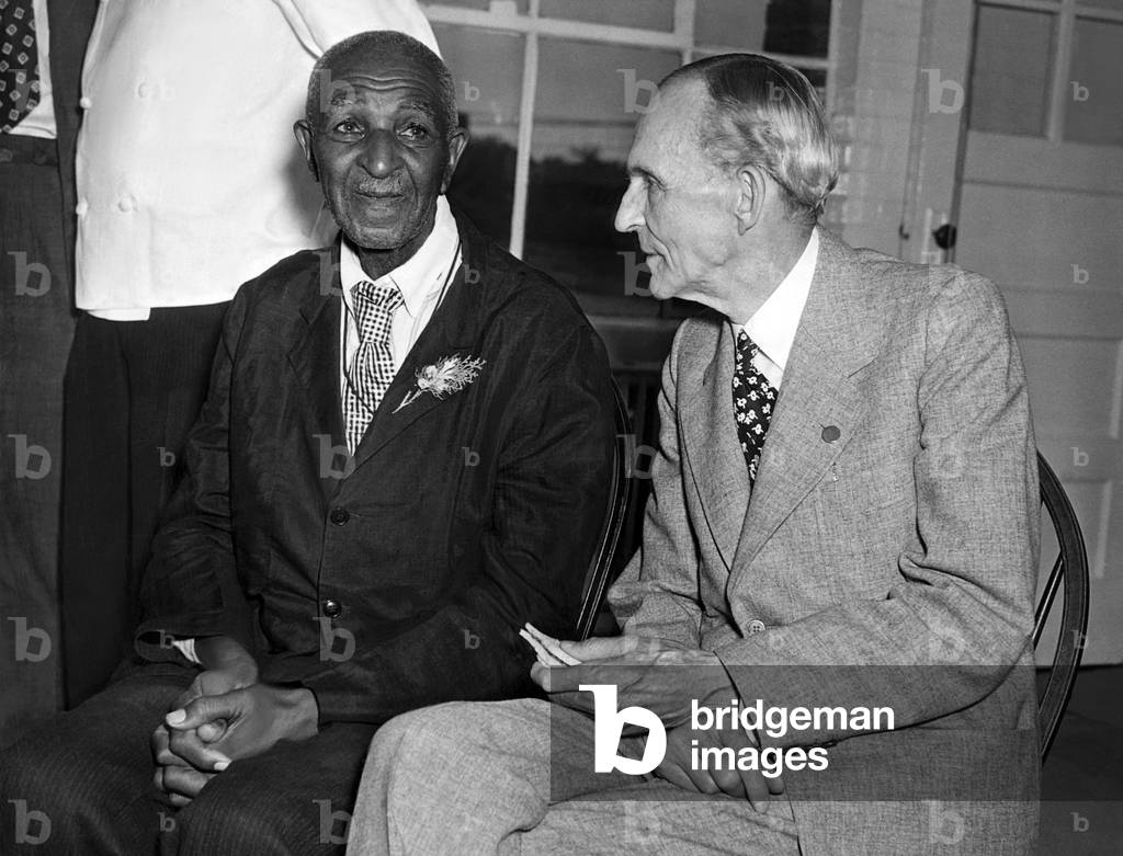 George Washington Carver signs up to do reseach at Ford Laboratories with Henry Ford, 1942