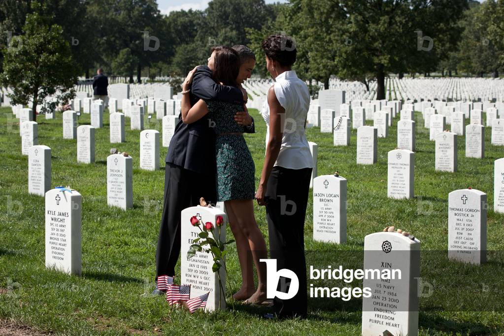 Barack Obama: President Barack Obama hugs a woman during a visit with First Lady Michelle Obama to Section 60 of Arlington National Cemetery in Arlington, Va., Sept. 10, 2011. Section 60 is reserved for military personnel who have lost their lives while fighting in Afghanistan and Iraq.
