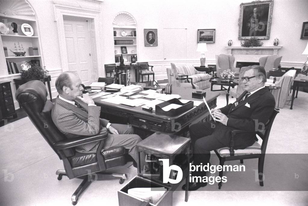 President Gerald Ford meets with VP Nelson Rockefeller in the Oval Office. Both men came to their offices through appointment and Congressional ratification according to the 25th Amendment. March 12 1975