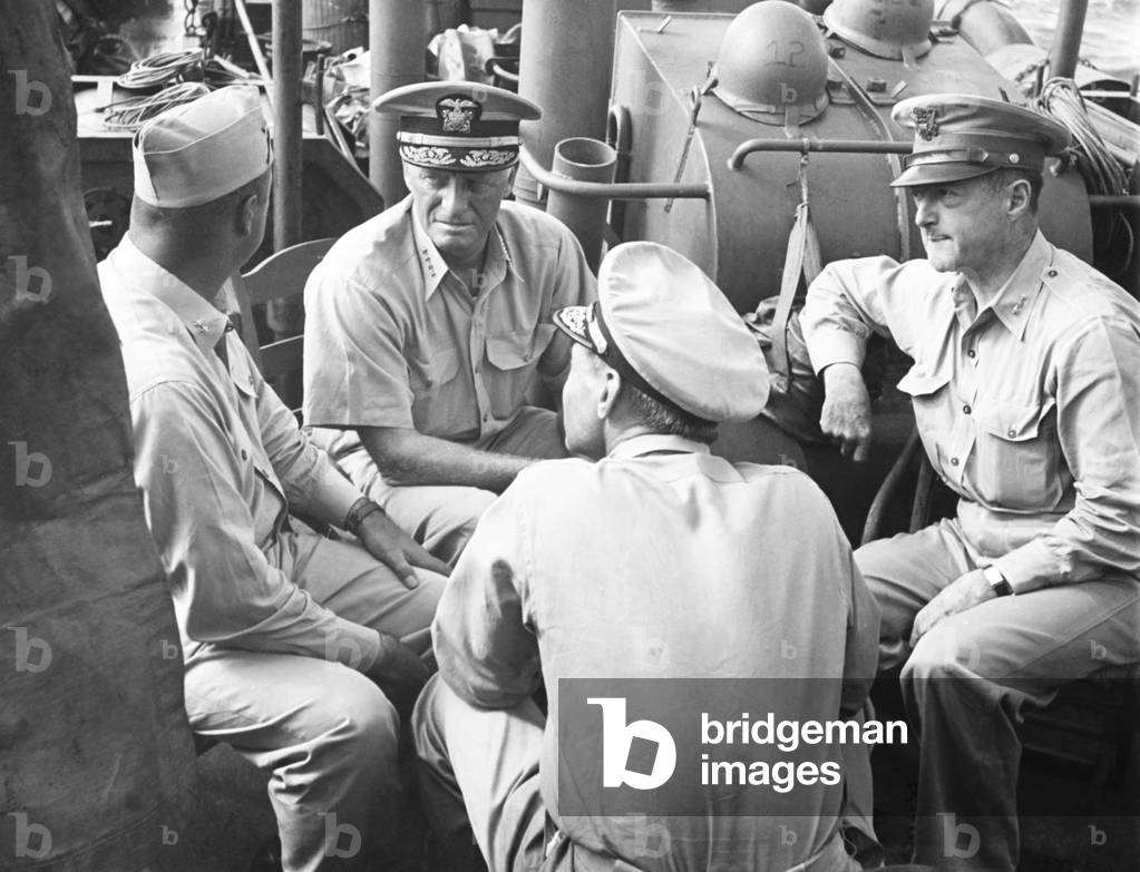 Fleet Admiral Chester Nimitz, facing camera, with Lieutenant General Robert Richardson, head of the US Army Hawaii Department, right, aboard a naval craft nearing the Kwajalein Atoll, February 1944