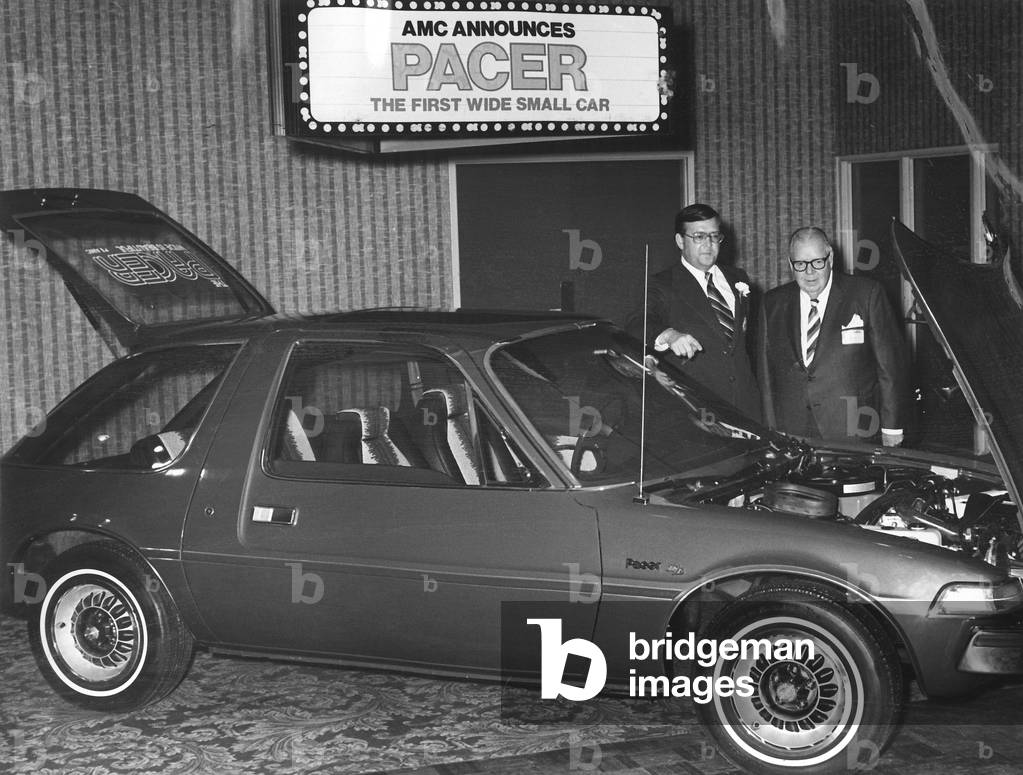 AMC introduces The Pacer, their first wide, small car. Vic Kray & Jack Rocks, managers at AMC in Cleveland, OH, are promoting the car, February 25, 1975