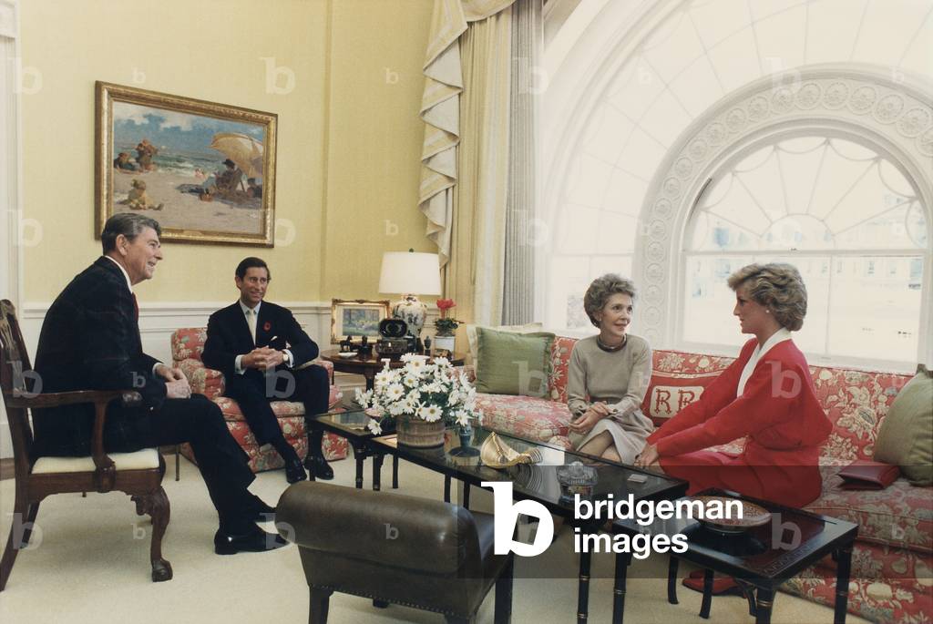 President and Nancy Reagan having tea with Prince Charles and Princess Diana in the White House Residence. Nov. 9, 1985 (b/w photo)