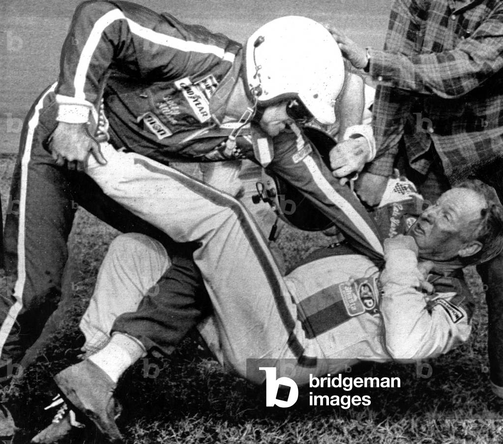 Bobby Allison (L)fights with Cale Yarborough (R) after a collision between Allison and Yarborough on the final lap of the race cost Allison the victory. Richard Petty won as a result. Daytona 500, Daytona Beach, FL. 02-18-79.