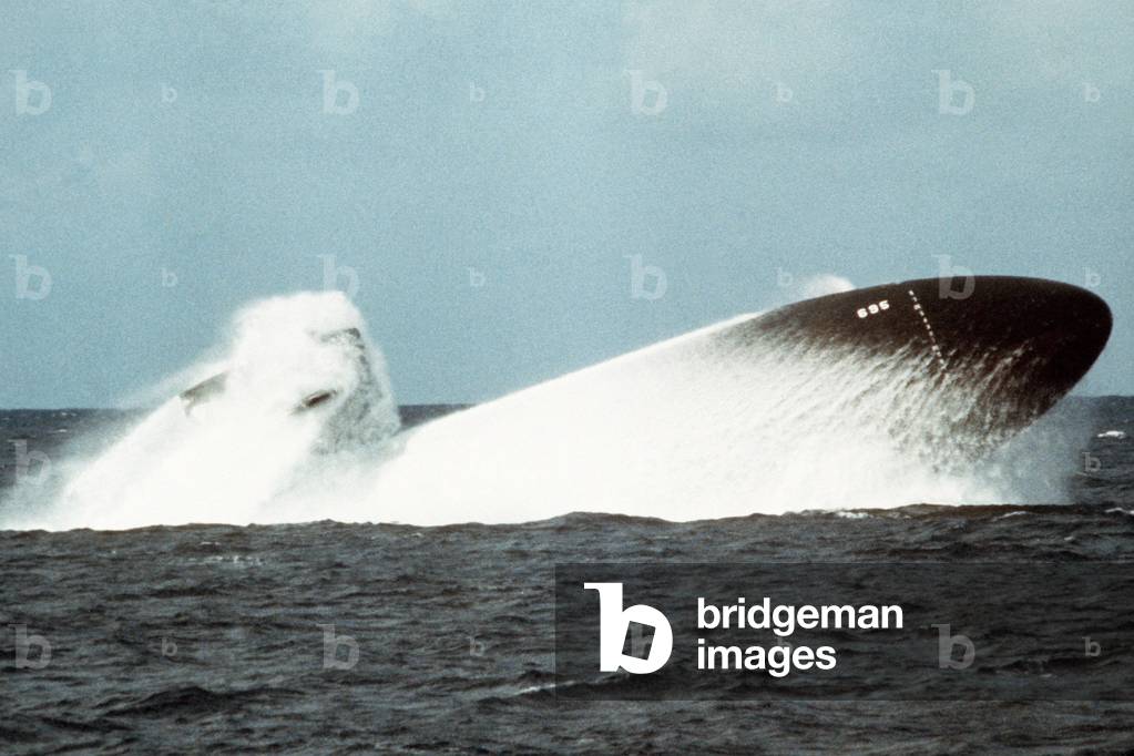 The nuclear-powered attack submarine BIRMINGHAM conducting an emergency surfacing exercise during sea trials. Nov. 19 1978