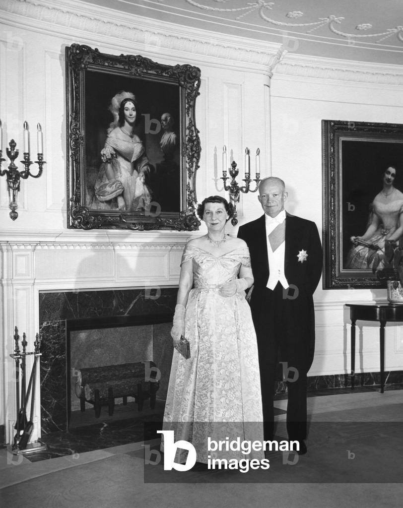 President and Mamie Eisenhower before a dinner at the Ethiopian Embassy in honor of Haile Selassie. May 28, 1954.