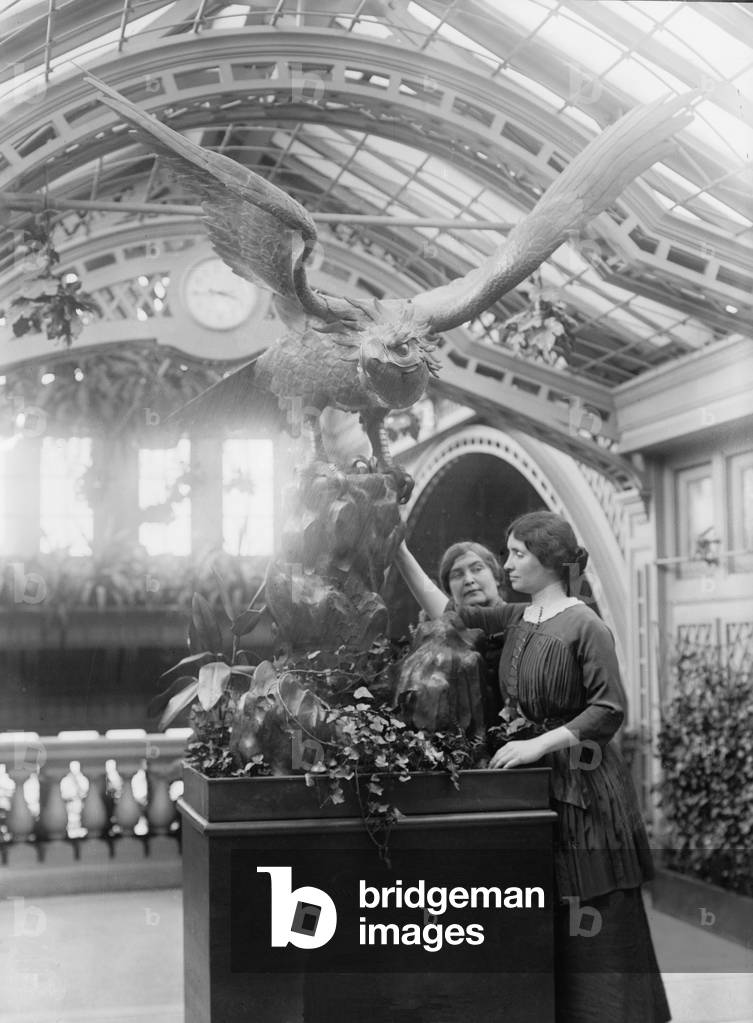 Helen Keller (1880-1968), blind and deaf since age 2, using her hands to 