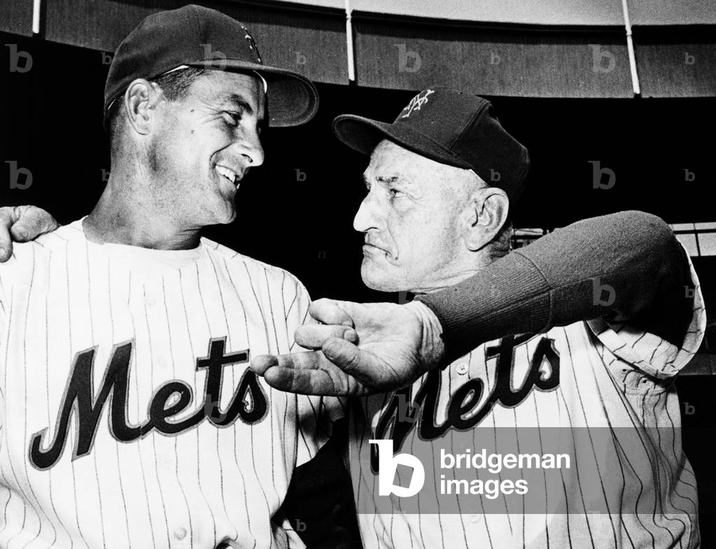 Manager Casey Stengel of the New York Mets gives pitcher David Hillman throwing advice. April 27, 1962