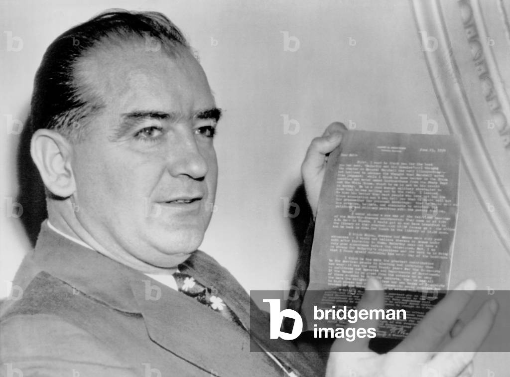 McCarthy with a letter from former war secretary Harry Woodring. Aug. 2, 1954