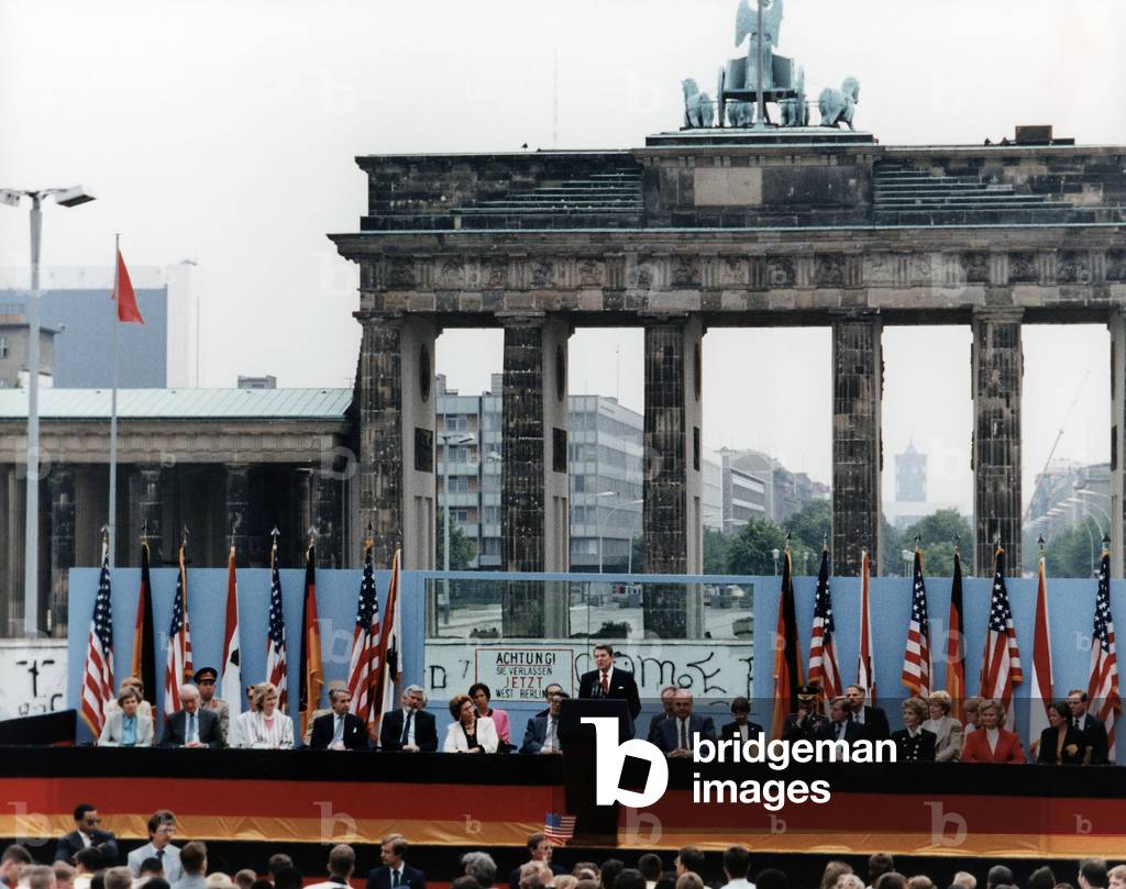 Ronald Reagan. President Reagan giving a speech at the Berlin Wall, (the 'tear down this wall!' speech). Brandenburg Gate, Federal Republic of Germany. June 12, 1987