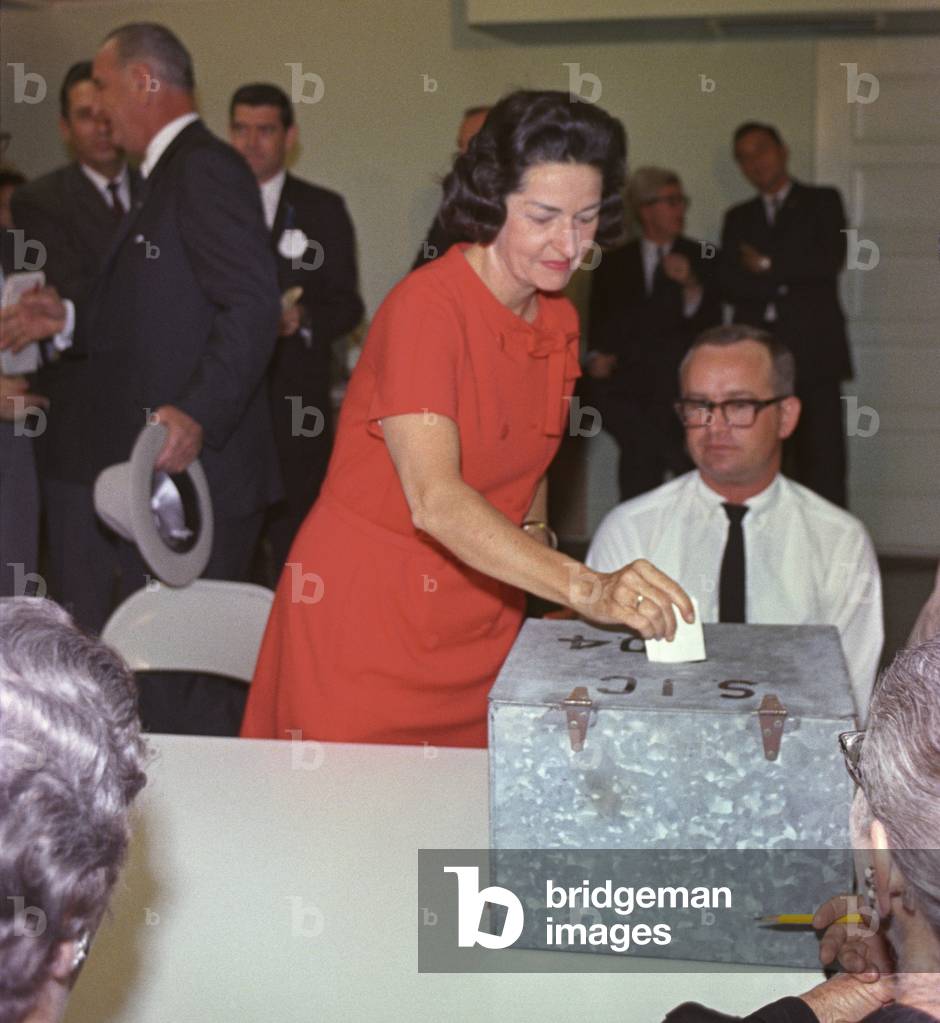 1964 Presidential Election. Lady Bird Johnson places her vote in the ballot box at Johnson City, Texas. Nov. 3, 1964