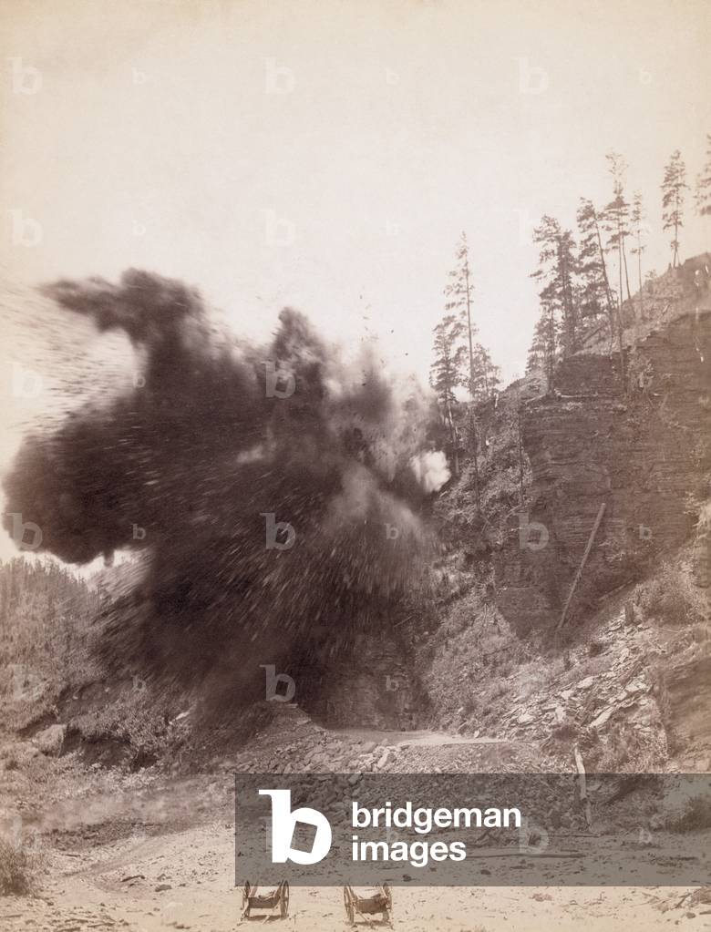Smoke from a dynamite blast during railroad construction near Deadwood, South Dakota. c. 1890