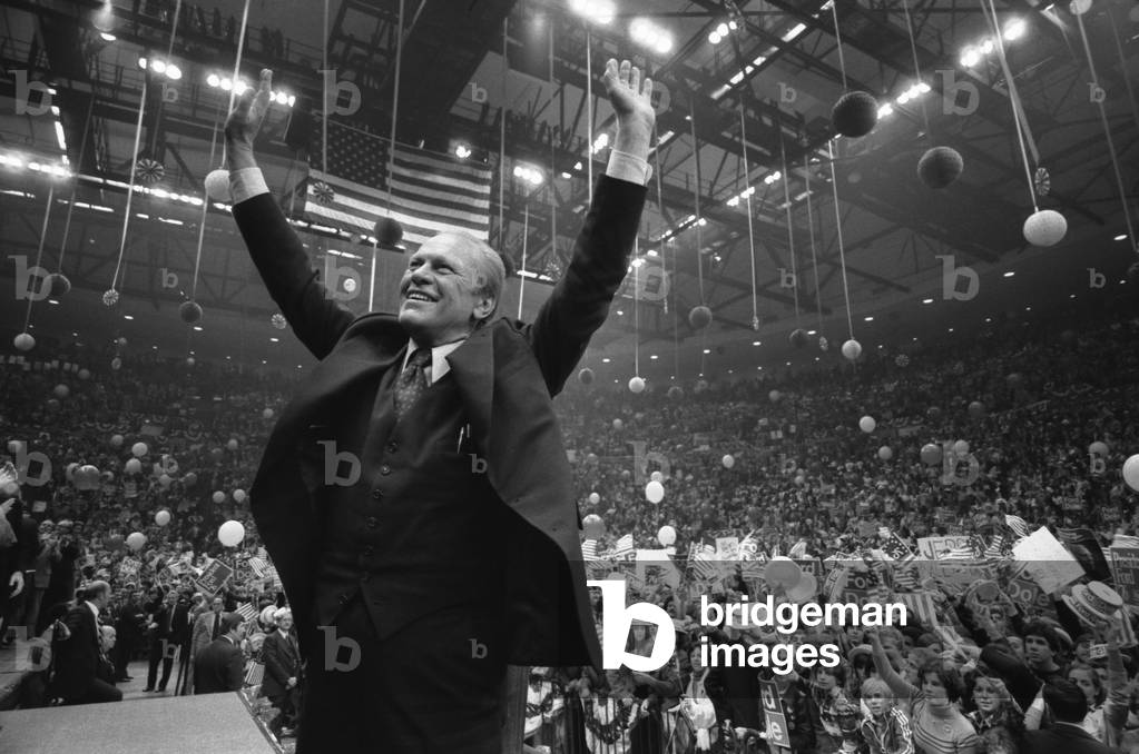 President Ford Acknowledges the cheers of the crowd in the Hempstead New York in the final days of his Presidential campaign. October 31 1976