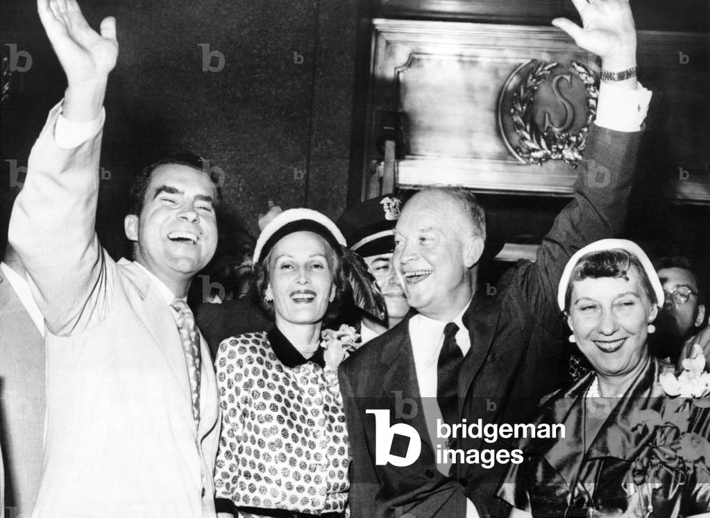 Republican Presidential nominee, Dwight Eisenhower and his running mate, Senator Richard Nixon of California and their wives, Mamie and Pat, outside Conrad Hilton hotel. July 11, 1952