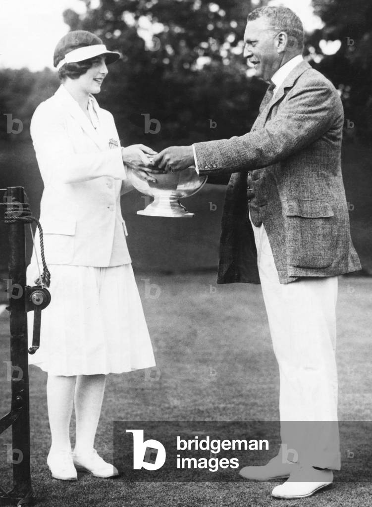 Helen Wills, tennis champion from California receiving trophy. c. 1925