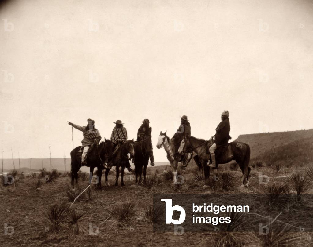 Apaches. The lost trail- Five Apache on horseback in the desert. photo by Edward S. Curtis, 1903
