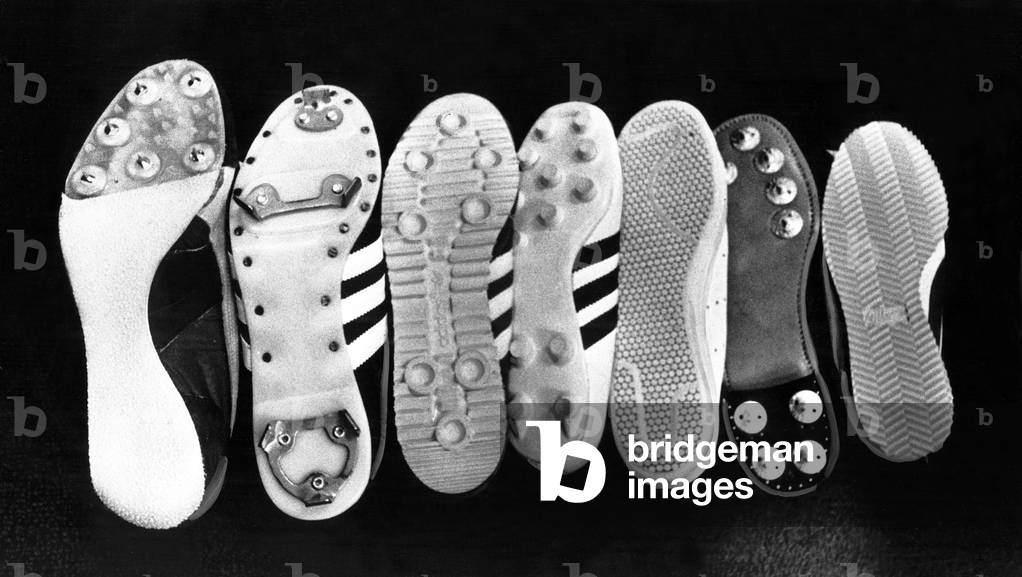 Sneakers, (l to r: track cleat, baseball cleat, nylon running shoe, soccer cleat, tennis shoe, golf cleat, leather running shoe), 1977