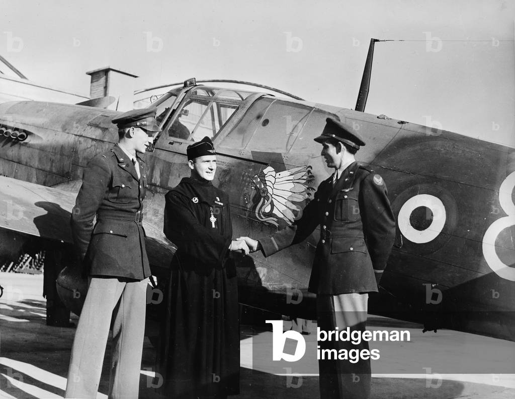 World War II, Lieutenant Hal C. Tunnell, introducing the Reverend R. P. Bougerol, Chaplain of the Lafayette Escadrille, to Lieutenant J. J. Ketcher, c.1940-1946