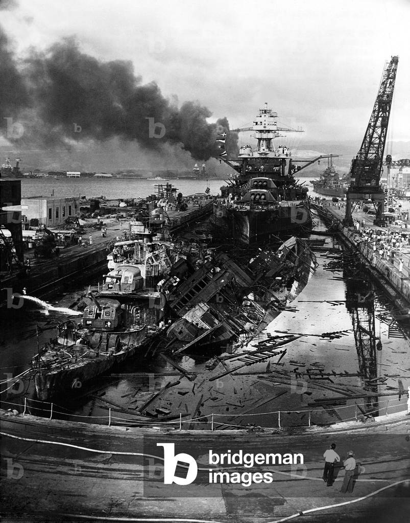 The wreckage of the destroyers USS Downes (left) and USS Cassin at Pearl Harbor dry dock. Both ship's hulls were damaged beyond repair in the Japanese attack of Dec. 7, 1941 New hulls were built around the ships' salvaged cores and given the wrecked ship's names and hull numbers