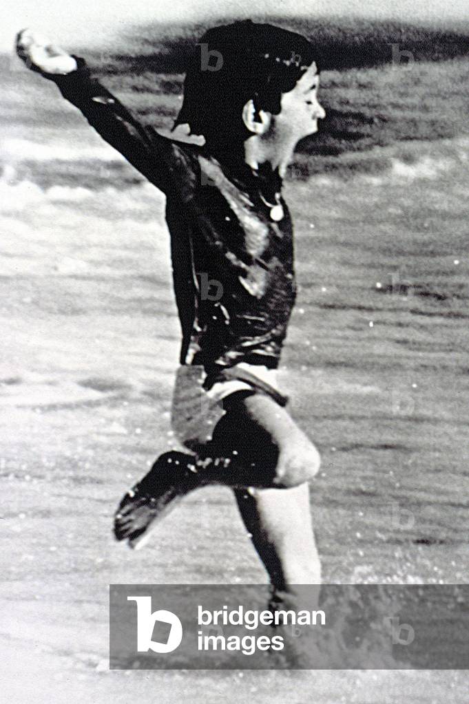 JOHN F. KENNEDY Jr., on a beach in Antigua, December 27, 1966