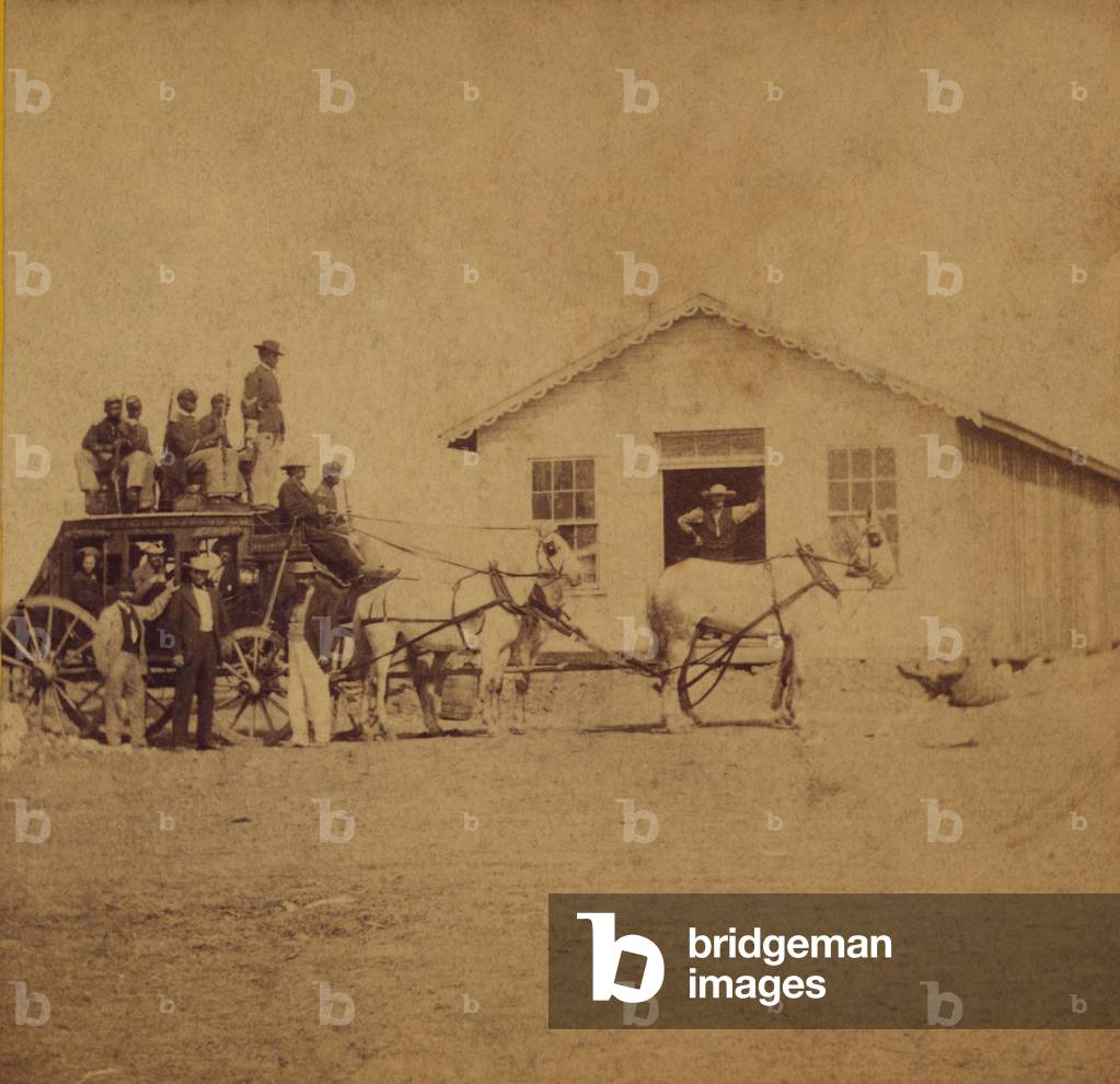 United States Express overland stage starting for Denver from Hays City Kansas was guarded by five African American soldiers. Photo by Alexander Gardner. c. 1867