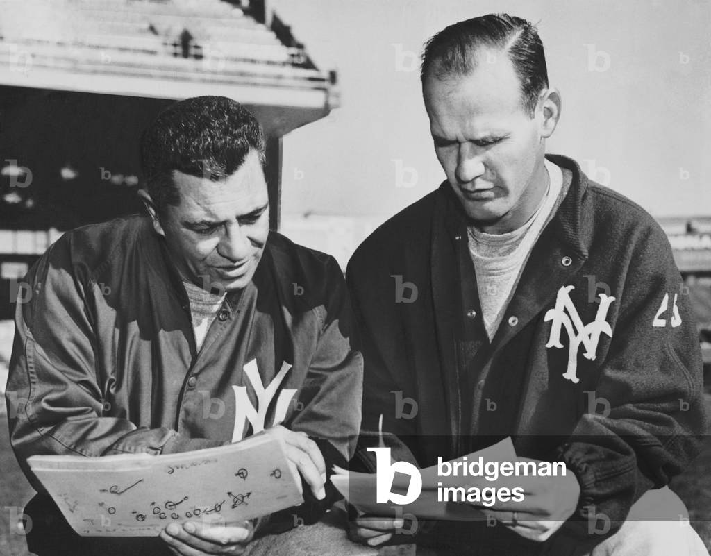 NY Giants coaches, Tom Landry and Vince Lombardi reviewing play charts, Nov. 15, 1958.