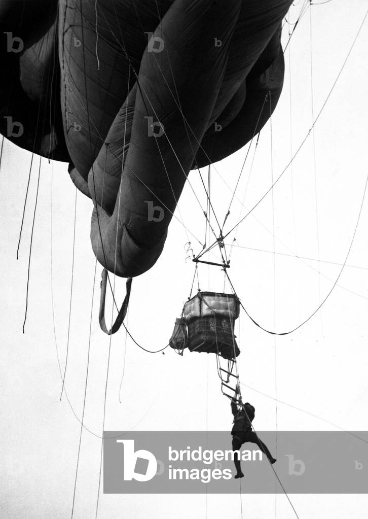 World War I aerial Naval observer coming down from a 'Blimp' type balloon after U-Boat scouting somewhere on the U.S. Atlantic Coast. c. 1918