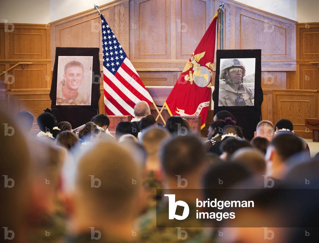 Families and friends honor two fallen Marines held a memorial ceremony for Sgt. Joe L. Wrightsman and 1st Lt. Scott J. Fleming at the Marine Corps Base Hawaii on Jan. 14 2011. Both were killed in Afghanistan in 2010