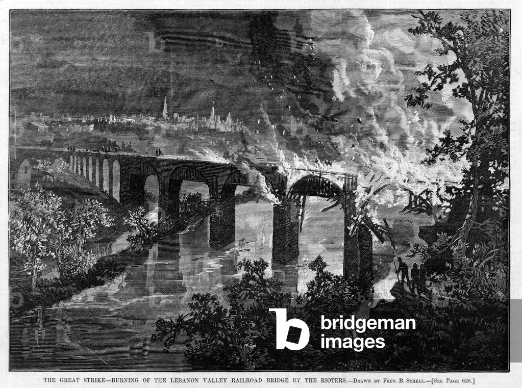 Great Railroad Strike of 1877. Burning of the Lebanon Valley Railroad bridge by the rioters. Pennsylvania, Woodcut, 1877
