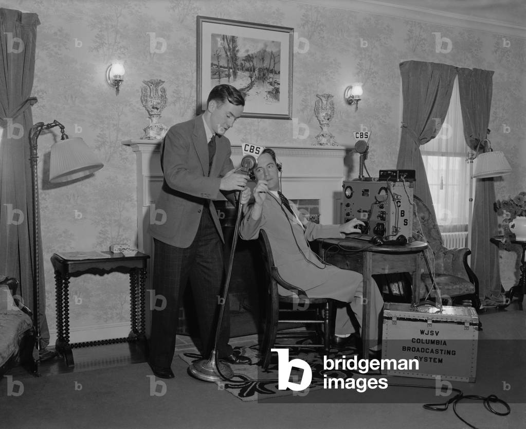 CBS Radio engineers testing the mikes and controls before a coast-to-coast broadcast,1937